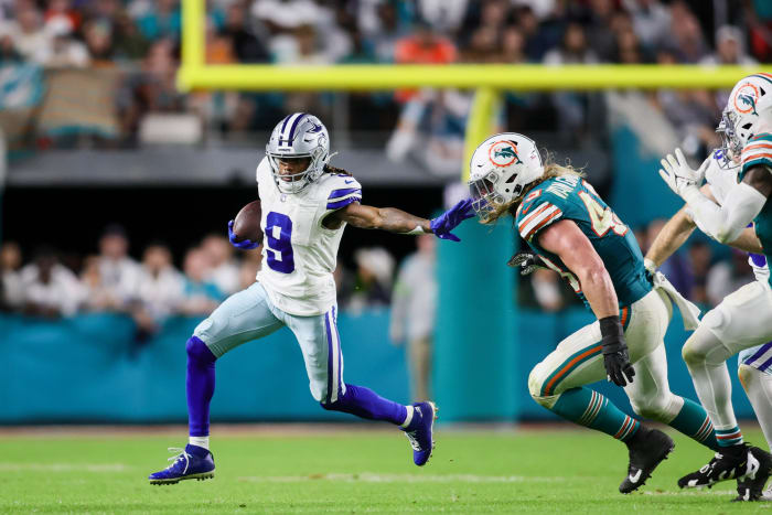 Dec 24, 2023; Miami Gardens, Florida, USA; Dallas Cowboys wide receiver KaVontae Turpin (9) runs with the football against Miami Dolphins linebacker Andrew Van Ginkel (43) during the fourth quarter at Hard Rock Stadium.
